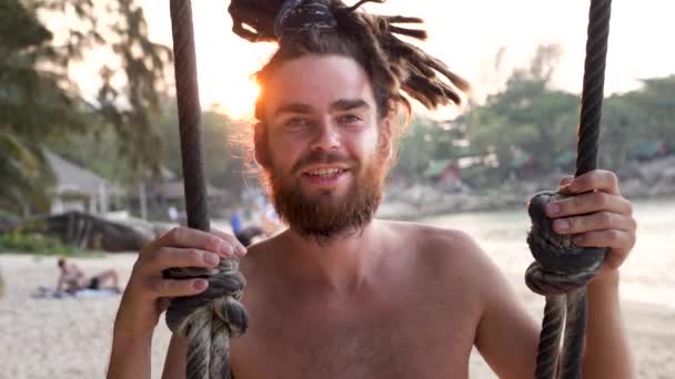 Dreadlocks Hairstyle Man Swing Beach on Seashore — Stock Footage Dreadlocks Hairstyle Man Swing Beach on Seashore Video Clip