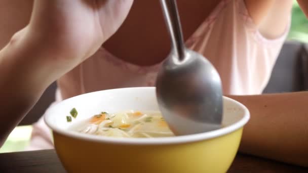 Female Eats Soup in Garden — Stockvideo