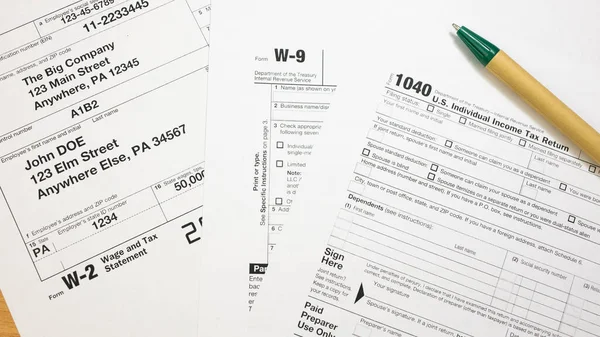 IRS 1040, W-2 and W-9 tax return form