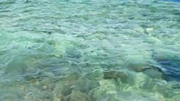 Water suface in bay — Stockvideo