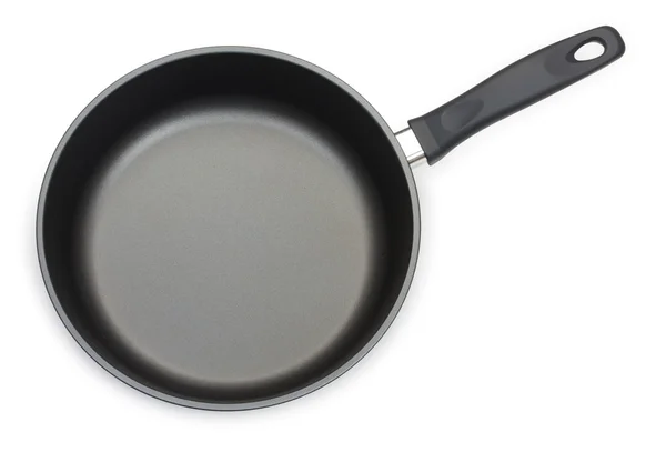 Black frying pan isolated on white background, close-up, top vie — Stock Photo, Image