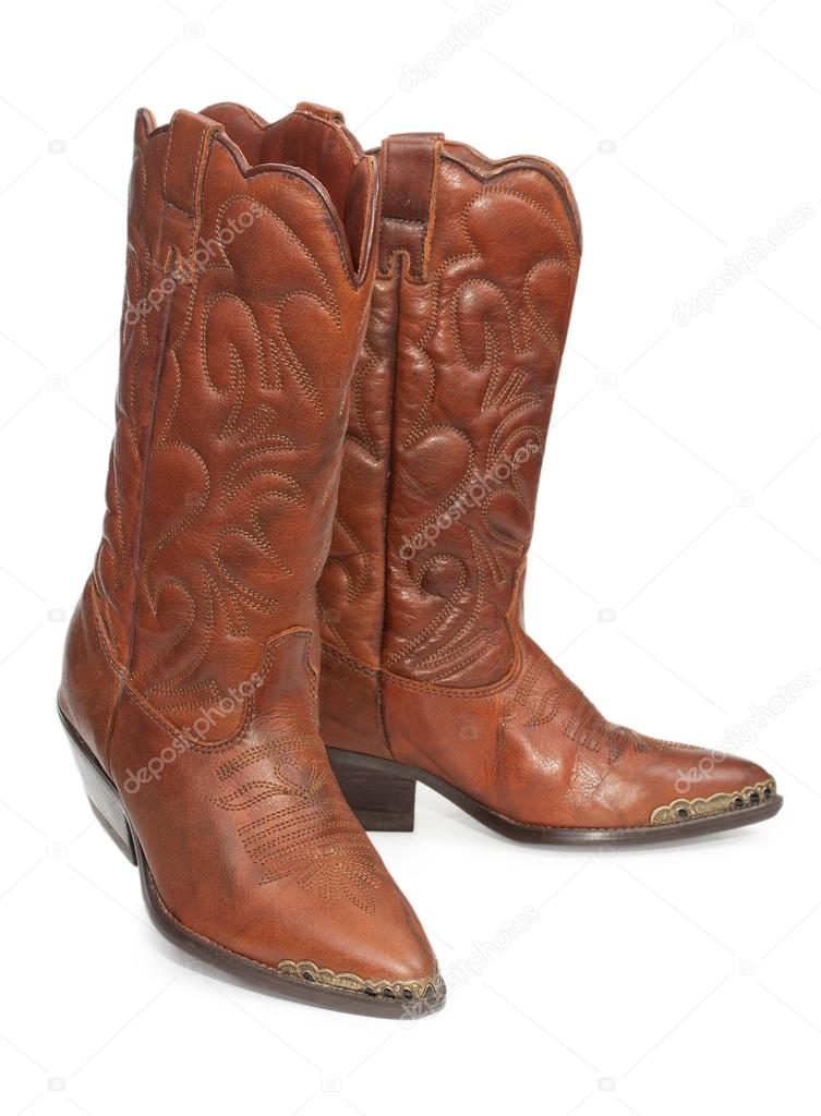 Women's fashion boots. Ladies vintage leather cowboy shoes. Isol