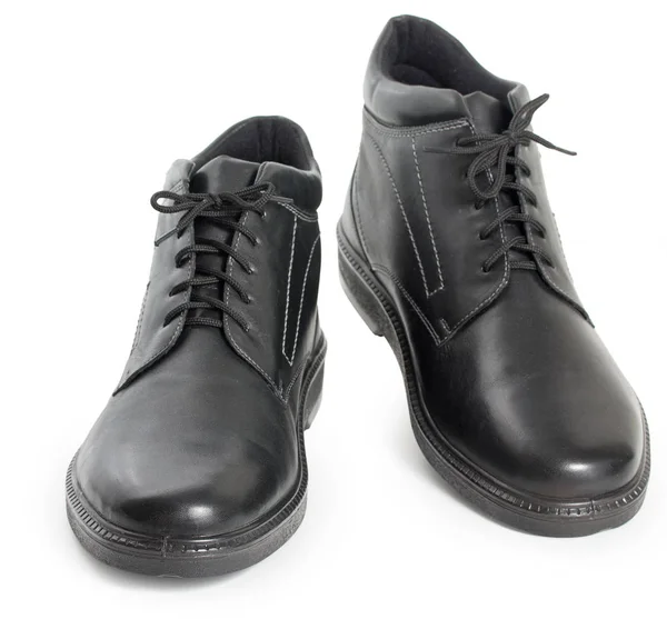 Pary czarne męskie skórzane buty zimowe na białym tle na biały tył — Zdjęcie stockowe