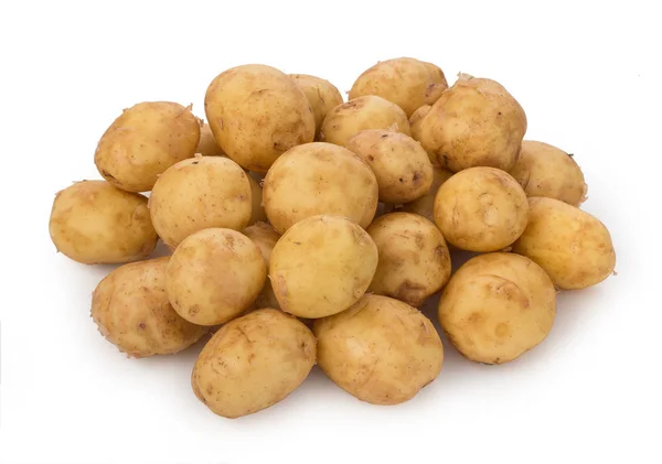 Sterty nowych bulw ziemniaka na białym tle. — Zdjęcie stockowe