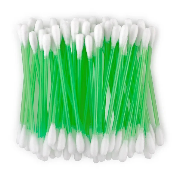 Group of green plastic cotton buds, swabs heaped in a pile on wh — Stock Photo, Image
