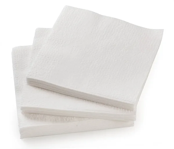 Gran pila de servilletas de papel blanco aisladas sobre un fondo blanco , — Foto de Stock