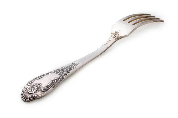 Rear side of old rusty vintage silver fork isolated on a white b — Stock Photo, Image