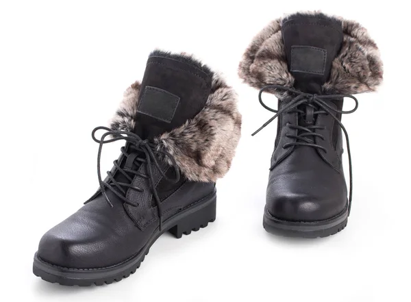 Pair of black winter fashion womens boots with fur isolated on a — Stock Photo, Image