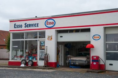 Old restored vintage Esso petrol station clipart
