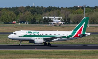Alitalia Airbus A319 take off at Berlin Tegel airport clipart