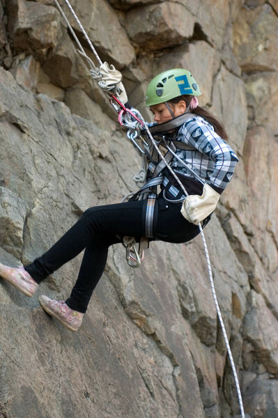 Днепропетровск, Украина - 2 апреля: Украинская девушка в действии во время городских соревнований по альпинизму среди детей 2 апреля 2011 года в Днепропетровске, Украина
 