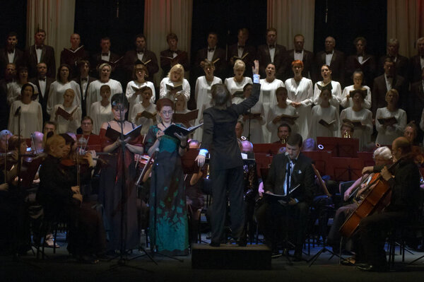 DNEPROPETROVSK, UKRAINE - MAY 27: Choir DUMKA and Symphonic Orchestra - main conductor Natalia Ponomarchuk perform Verdi's REQUIEM on May 27, 2013 in Dnepropetrovsk, Ukraine