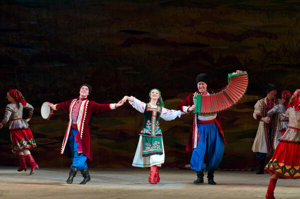 DNIPROPETROVSK, UKRAINE - NOVEMBER 21: Members of the Folklore Ensemble SLAVUTYCH perform UKRAINE at State Opera and Ballet Theatre on November 21, 2014 in Dnipropetrovsk, Ukraine