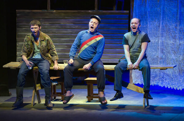 DNIPROPETROVSK, UKRAINE - OCTOBER 31, 2015: Sergei Klimenko , Alexander Kornilenko and Vladimir Kosonogov perform DEADLINE at the Dnipropetrovsk Youth Theatre VERIM.