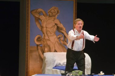 DNIPROPETROVSK, UKRAINE - OCTOBER 30, 2015: Jean Melnikov performs A liar is required at the Dnipropetrovsk State Russian Drama Theatre. clipart