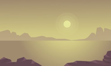 Cliff ve göl manzara siluet