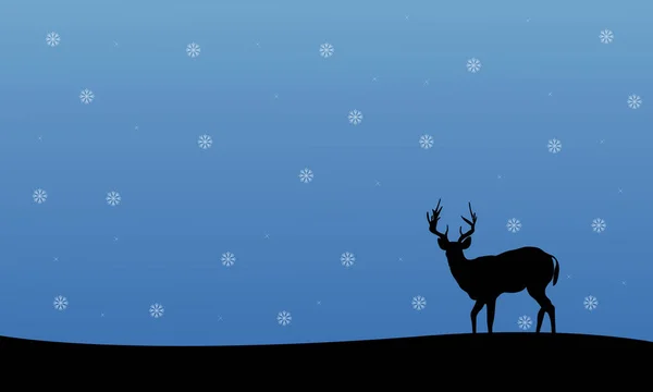 鹿冬季圣诞风景的剪影 — 图库矢量图片