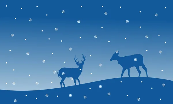Siluet rusa dengan salju pemandangan Natal - Stok Vektor