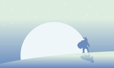 Santa silüeti büyük ay manzara ile