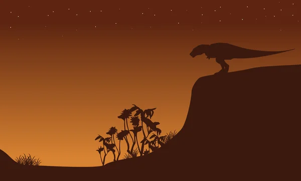 Silhouette de Tyrannosaure sur la falaise — Image vectorielle