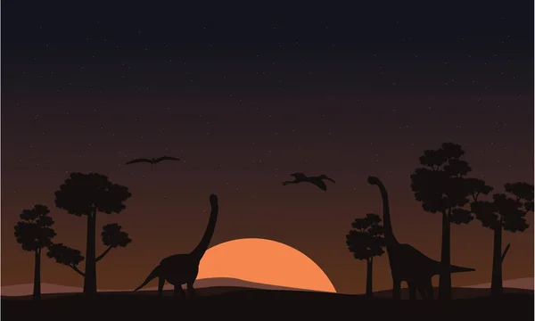 Bij zonsondergang brachiosaurus landschap van silhouetten — Stockvector