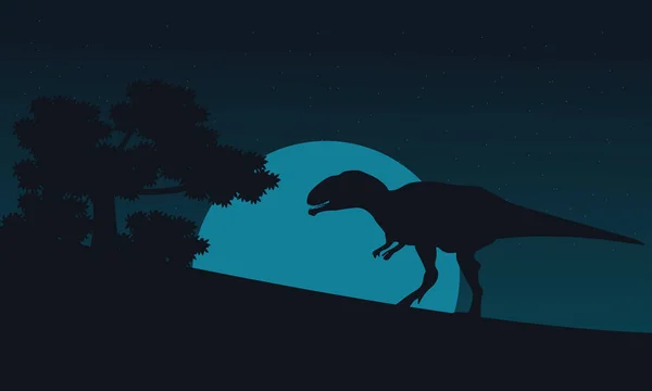 Silueta mapusaurus na kopci v noci — Stockový vektor