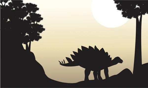 Paysage de silhouettes de stegosaurus sur la colline — Image vectorielle