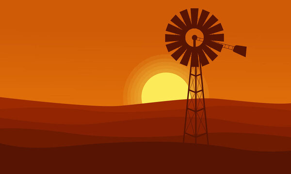 Windmill on desert scenery orange background