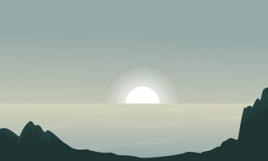 Deniz kenarında günbatımı manzara siluetleri