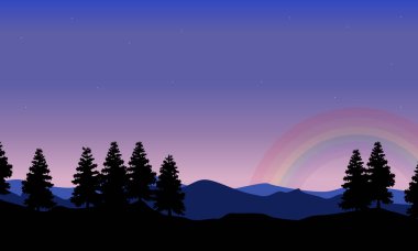 Gökkuşağı peyzaj ile tepede çam fidanı