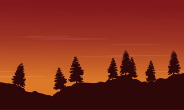 Turuncu gökyüzü sahne ile ağaç silüeti