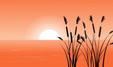 Kaba çimenlerin üzerinde nehir silüeti