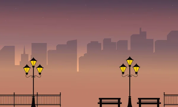 Sylwetka miasto w nocy z lampy uliczne — Wektor stockowy