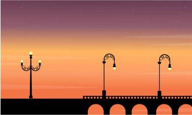 Sokak lambası manzara siluetleri ile köprü