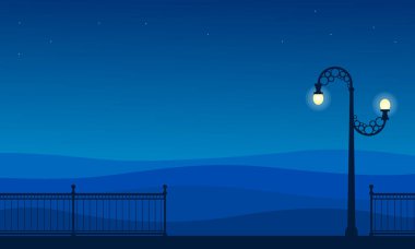 Sokak lambası ve çit sahne siluet