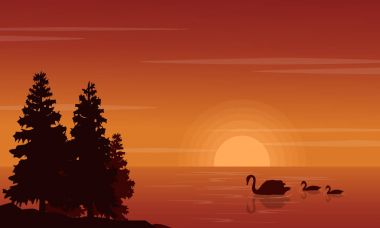 Siluet turuncu zemin üzerine kuğu manzara