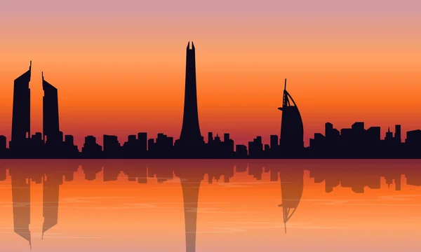 Sylwetka panoramę Dubaju o zachód słońca krajobraz — Wektor stockowy