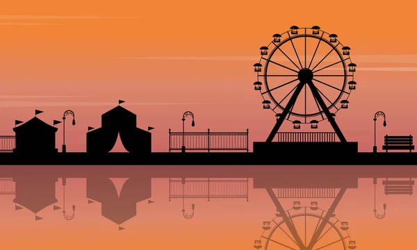 Silhouette de parc d'attractions avec paysage réfléchissant — Image vectorielle