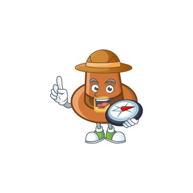 Karakteri pusula olan kahverengi bir şapka.