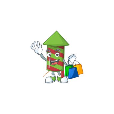 Neşeli yeşil çizgili havai fişek roket çizgi film karakteri el sallıyor ve alışveriş torbaları tutuyor.