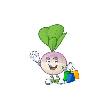 Neşeli şalgam maskotu el sallıyor ve alışveriş torbaları tutuyor.