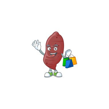 Neşeli patates maskotu el sallıyor ve alışveriş torbaları tutuyor.