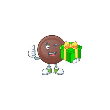 Hediye kutusu olan gülen çikolata topu karakteri.