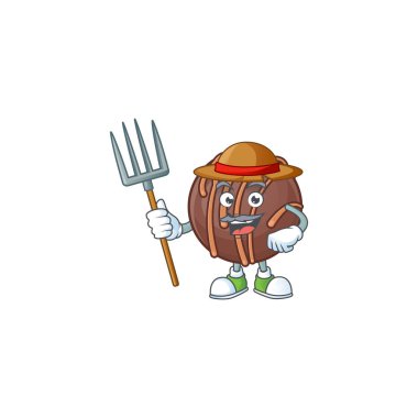 Şirin Çiftçi çikolatalı praline topu şapkası ve aletleri olan maskot.