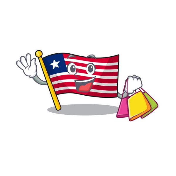 Fröhliches Gesicht Flagge Liberia scroll Maskottchen Stil winken und halten Einkaufstasche — Stockvektor