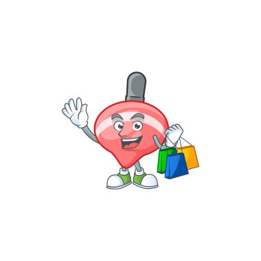 Mutlu bir Çinli kırmızı tepeli oyuncak el sallıyor ve alışveriş torbası tutuyor.