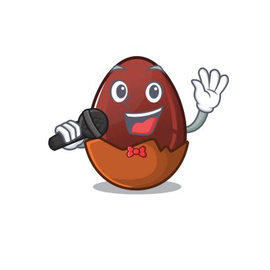 Mikrofonda şarkı söyleyen mutlu çikolata yumurtası