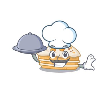 Tepside yemek servisi yapan bir şefin havuçlu keki resmi.