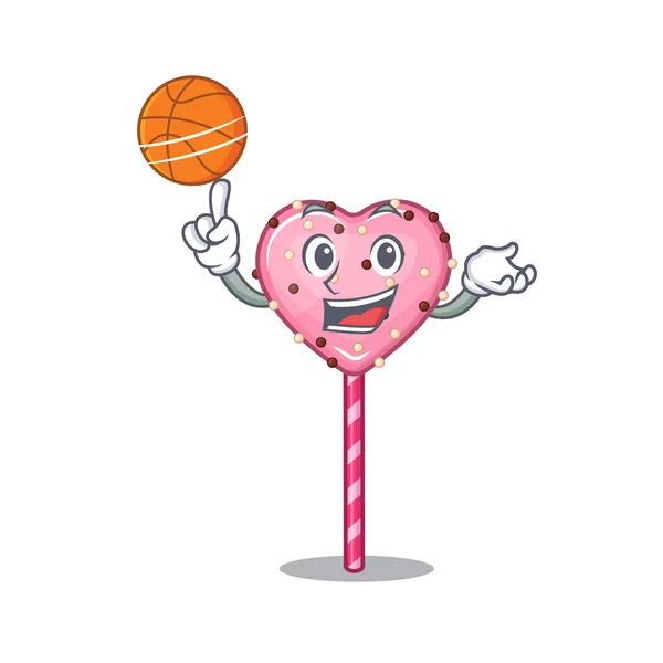 Une image de mascotte de bonbons coeur sucette personnage de dessin animé jouer au basket-ball — Image vectorielle