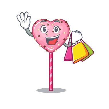 A friendly rich candy heart lollipop waving and holding Shopping bag